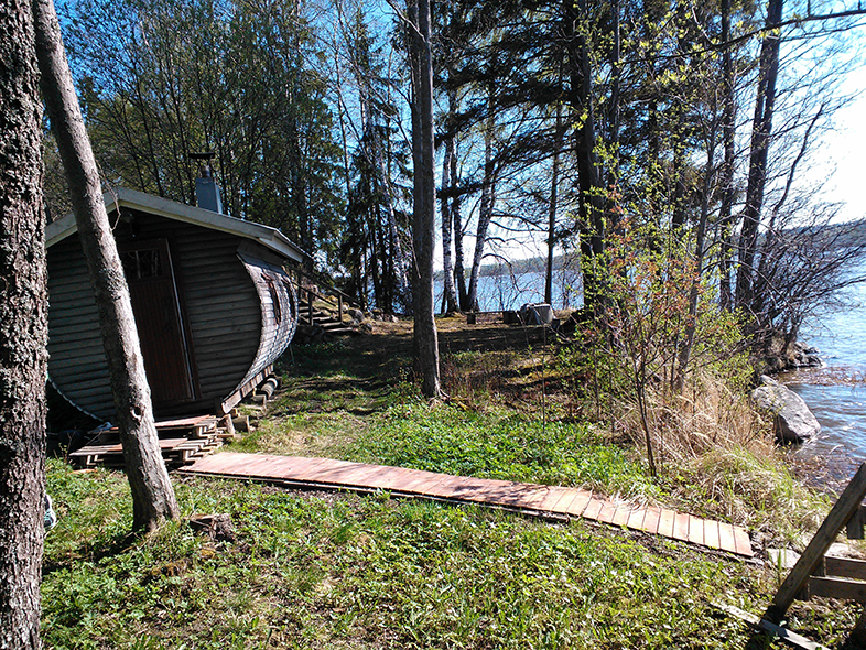 Rantasauna ja mökki – sauna by lake and cottage